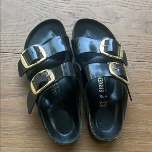 Birkenstock Black Slides with Gold Accents